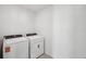 Bright laundry room featuring a new washer and dryer at 4556 Windy Oak Way, St Cloud, FL 34772