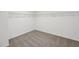 Walk-in closet space with neutral carpeting and white walls at 4556 Windy Oak Way, St Cloud, FL 34772