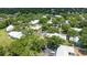 An aerial view of a multi-unit residential complex featuring a swimming pool and mature landscaping at 5417 Lake Margaret Dr # 39, Orlando, FL 32812