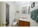 Bathroom featuring a single vanity, toilet, mirror, and shower at 5417 Lake Margaret Dr # 39, Orlando, FL 32812
