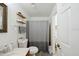 Bathroom featuring a single vanity, toilet, mirror, and shower/tub combo at 5417 Lake Margaret Dr # 39, Orlando, FL 32812