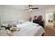 Comfortable bedroom features neutral paint, ceiling fan and plush carpeting, creating a peaceful oasis at 5417 Lake Margaret Dr # 39, Orlando, FL 32812