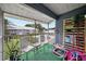 Screened patio with seating area overlooking the community at 5417 Lake Margaret Dr # 39, Orlando, FL 32812