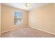 Bedroom with large window, allowing for plenty of natural light at 5512 Metrowest Blvd # 203, Orlando, FL 32811