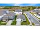 Aerial view of a house with well-maintained landscaping and a two-car garage in a Gathering-friendly neighborhood at 5733 Iron Brand Rd, St Cloud, FL 34771