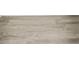 Close-up of new wood-look flooring at 6084 Sw 150Th Ln, Ocala, FL 34473