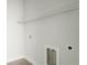 Empty laundry room with hookups and laminate floors at 6084 Sw 150Th Ln, Ocala, FL 34473
