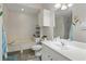 Bright bathroom with vanity, shower and large tub at 7620 Bay Port Rd # 39, Orlando, FL 32819