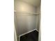 Walk-in closet with a wire shelf and dark wood floors, providing ample storage space at 1010 Loch Vail # 1125, Apopka, FL 32712
