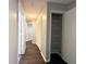 Hallway with closet and view of other rooms at 1010 Loch Vail # 1125, Apopka, FL 32712