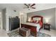 Spacious bedroom featuring a ceiling fan and tiled floors at 10783 Satinwood Cir, Orlando, FL 32825