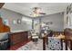 Cozy Bedroom with dark wood crib, dresser, and a calming color scheme at 10783 Satinwood Cir, Orlando, FL 32825