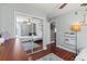 Bright bedroom boasts mirrored closet doors and a coordinating gray rug at 10783 Satinwood Cir, Orlando, FL 32825