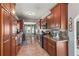 Stylish kitchen with stainless steel appliances, granite countertops, and ample cabinet space at 10783 Satinwood Cir, Orlando, FL 32825