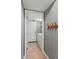Clean laundry area with washer, dryer, and convenient access to outside at 10783 Satinwood Cir, Orlando, FL 32825