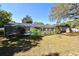 Backyard view with lush plants and screened in pool at 122 W Hillcrest St, Altamonte Springs, FL 32714