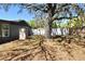 Spacious backyard featuring a large shade tree and white vinyl fence at 122 W Hillcrest St, Altamonte Springs, FL 32714