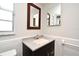 Bathroom featuring dark wood vanity with light granite countertops at 122 W Hillcrest St, Altamonte Springs, FL 32714
