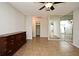 Bedroom with ceiling fan, tile flooring, and mirrored wall at 122 W Hillcrest St, Altamonte Springs, FL 32714