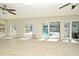 Spacious bonus room featuring tile flooring and multiple windows that offer a view of the pool at 122 W Hillcrest St, Altamonte Springs, FL 32714