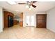 Spacious living room features tile flooring and view of the kitchen and outdoor access at 122 W Hillcrest St, Altamonte Springs, FL 32714
