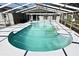 Screened-in backyard pool offering an ideal spot for relaxing and entertaining in a private outdoor setting at 122 W Hillcrest St, Altamonte Springs, FL 32714
