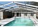 Enjoy swimming in this screened-in backyard pool, perfect for entertaining and relaxing outdoors at 122 W Hillcrest St, Altamonte Springs, FL 32714