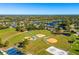 Aerial view of the community featuring baseball fields, tennis courts, and residential neighborhoods at 12712 Forestedge Cir, Orlando, FL 32828