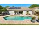 Inviting swimming pool with a paved patio, perfect for enjoying sunny days and outdoor relaxation at 12712 Forestedge Cir, Orlando, FL 32828