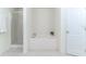 Clean, well-maintained bathroom featuring a soaking tub and a separate glass-enclosed shower at 1272 Mount Logan Dr, Apopka, FL 32712