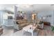 Open floor plan featuring living room, dining area and luxury vinyl floors at 1272 Mount Logan Dr, Apopka, FL 32712