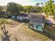 Aerial view of the property showcasing a screened-in pool, expansive backyard, and a well-maintained landscape at 133 Orange Ridge Dr, Longwood, FL 32779