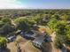 Lovely single-Gathering home boasts an in-ground screened pool and a large yard with mature trees at 133 Orange Ridge Dr, Longwood, FL 32779