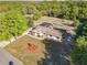 Expansive property with a screened pool, lush landscaping, and ample space at 133 Orange Ridge Dr, Longwood, FL 32779