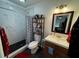 Updated bathroom with marble shower, tile floors, vanity, and modern fixtures at 133 Orange Ridge Dr, Longwood, FL 32779
