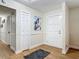 Bright entryway featuring new laminate floors and a closet at 133 Orange Ridge Dr, Longwood, FL 32779