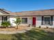 Charming house with a red door and manicured landscaping at 133 Orange Ridge Dr, Longwood, FL 32779