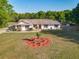 Charming home with red door and well maintained front yard at 133 Orange Ridge Dr, Longwood, FL 32779