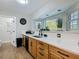 Bright kitchen boasts a large countertop space, garden window, and modern faucet at 133 Orange Ridge Dr, Longwood, FL 32779