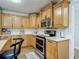 Kitchen boasts stainless steel appliances, cabinetry, and a spacious countertop with bar stool seating at 133 Orange Ridge Dr, Longwood, FL 32779