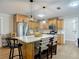 Kitchen with a center island, stainless steel appliances, plenty of cabinet space, and barstool seating at 133 Orange Ridge Dr, Longwood, FL 32779