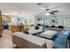 Open-concept living area features a modern kitchen, living, and dining areas with lots of natural light at 133 Orange Ridge Dr, Longwood, FL 32779