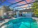 Exterior screened in pool with patio furniture, green grass, landscaping, and blue skies at 133 Orange Ridge Dr, Longwood, FL 32779
