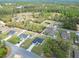 The bird's-eye view highlights a community with well-kept properties and abundant greenery in a peaceful environment at 16121 Sw 37Th Terrace Rd, Ocala, FL 34473
