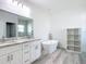 Bright bathroom showcasing double vanities, a soaking tub, and modern fixtures at 16121 Sw 37Th Terrace Rd, Ocala, FL 34473