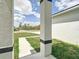 View of a front porch and walkway leading to a new construction home at 16121 Sw 37Th Terrace Rd, Ocala, FL 34473