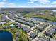 A Primary planned neighborhood with a community pool, a pond, and walking trails at 17055 Wynford Ln, Winter Garden, FL 34787
