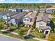 Beautiful aerial view of a neighborhood with well-maintained homes and lush landscaping at 17055 Wynford Ln, Winter Garden, FL 34787