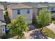 Overhead view of a well-maintained home with a brick driveway and lush trees at 17055 Wynford Ln, Winter Garden, FL 34787
