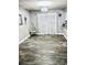 Spacious open living area with modern flooring and ample natural light at 1795 Orange View Ct, Kissimmee, FL 34746